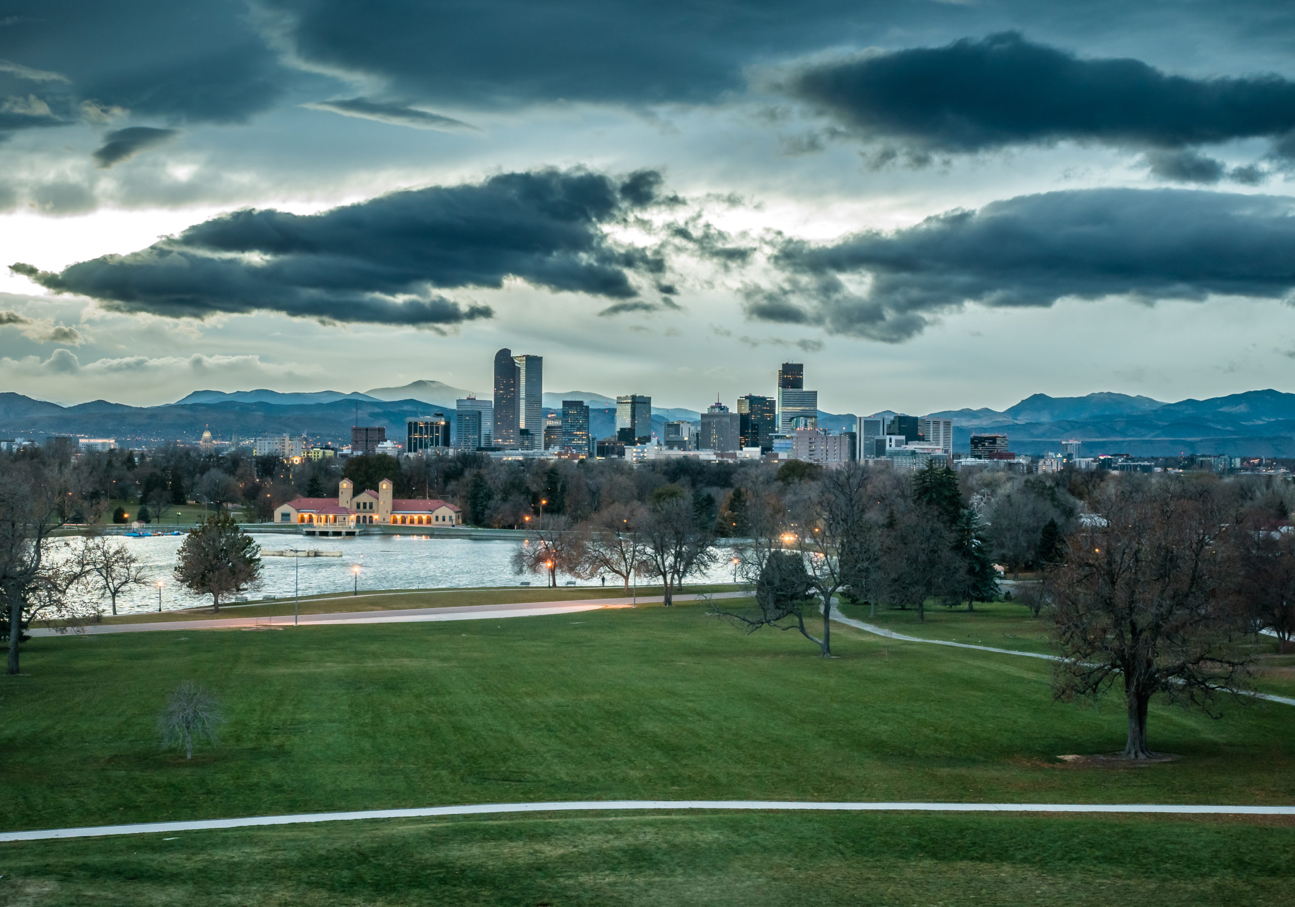 Downtown,Denver,Building,At,Night,With,Storm,Clouds,In,The